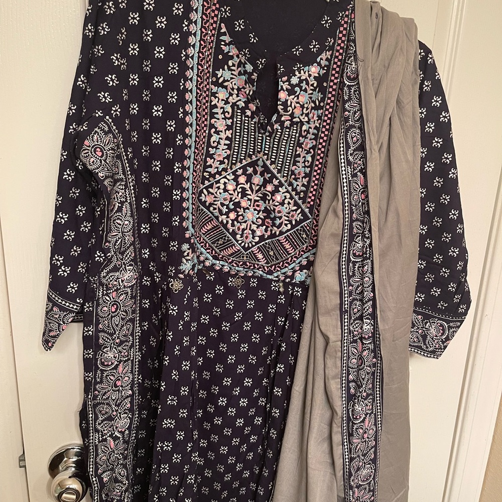 Nyra cut navy blue with pant style kameez. Selling coz its too big for me. 42 sz